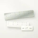 A ruler, weight, and thermometer representing three measurement categories